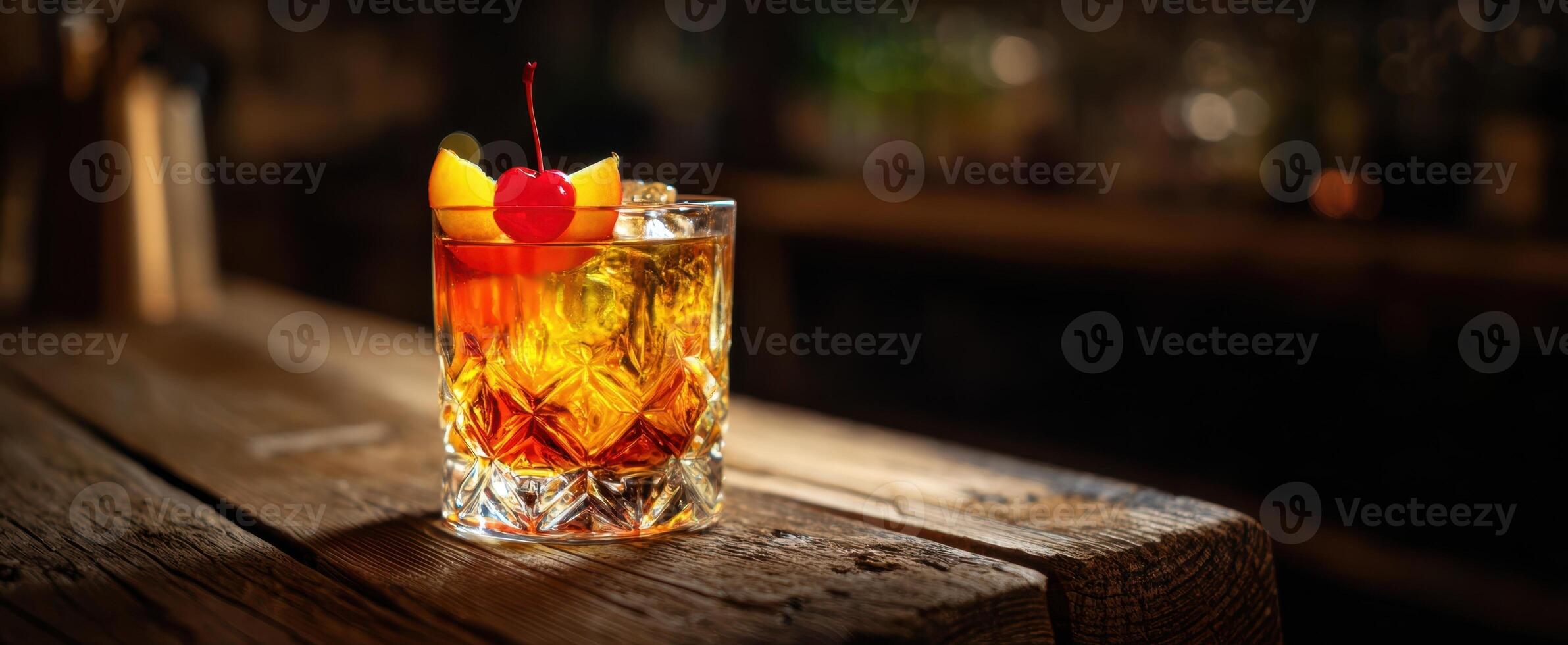 The Elegant Whiskey Cocktail with Cherries and Orange Garnish on Wood Table photo