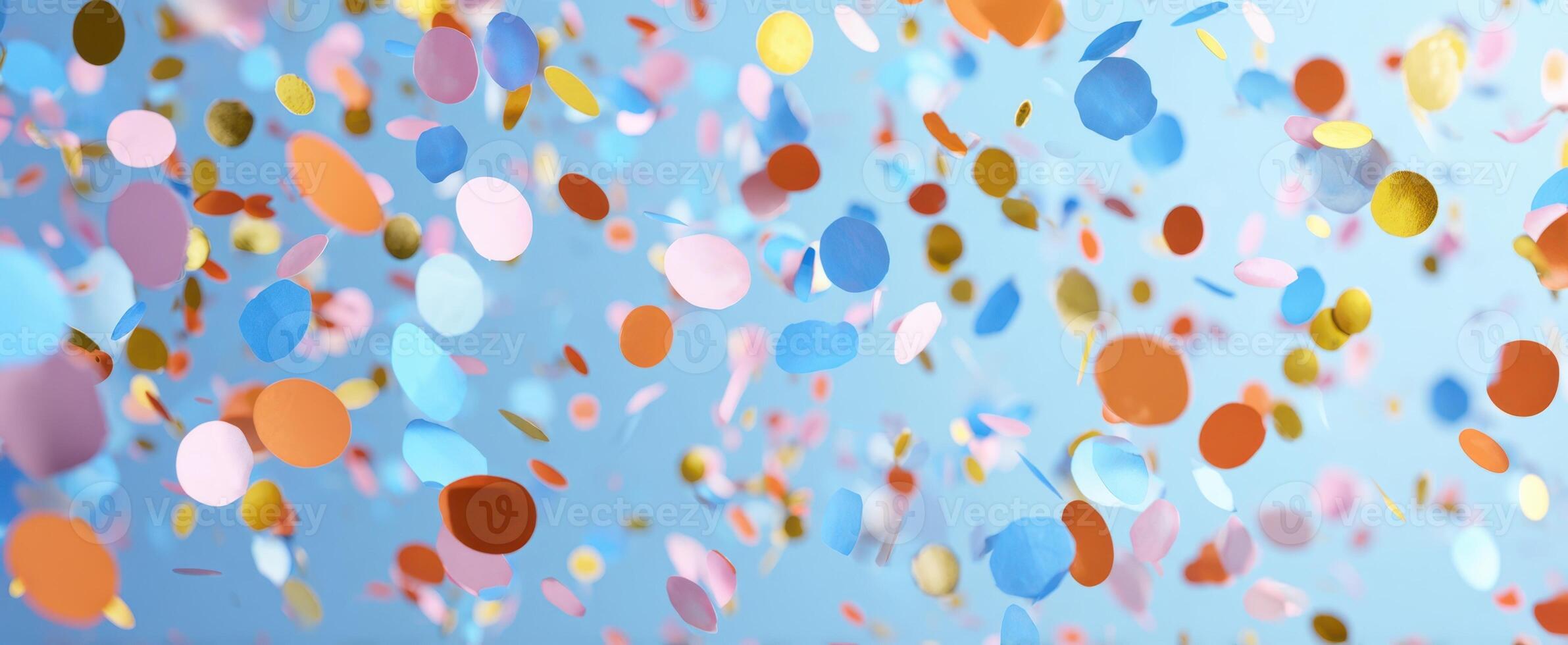 The colorful confetti flying through the air in a festive celebration background. photo