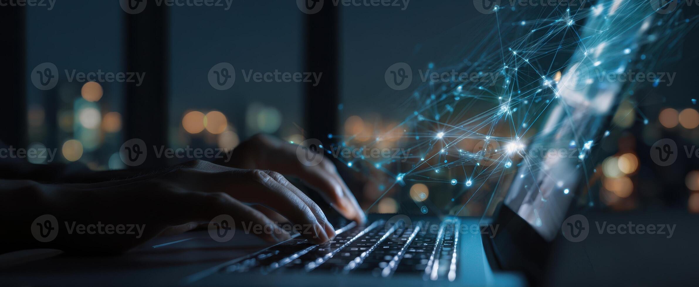 The laptop displaying an innovative digital networking concept at night. photo