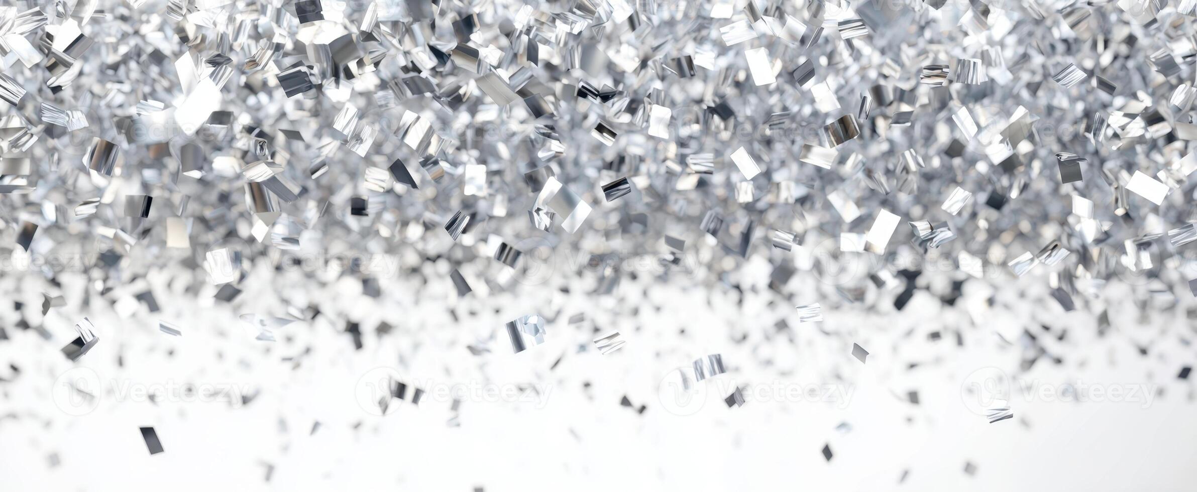 The shimmering silver confetti creating a festive atmosphere for celebrations. photo