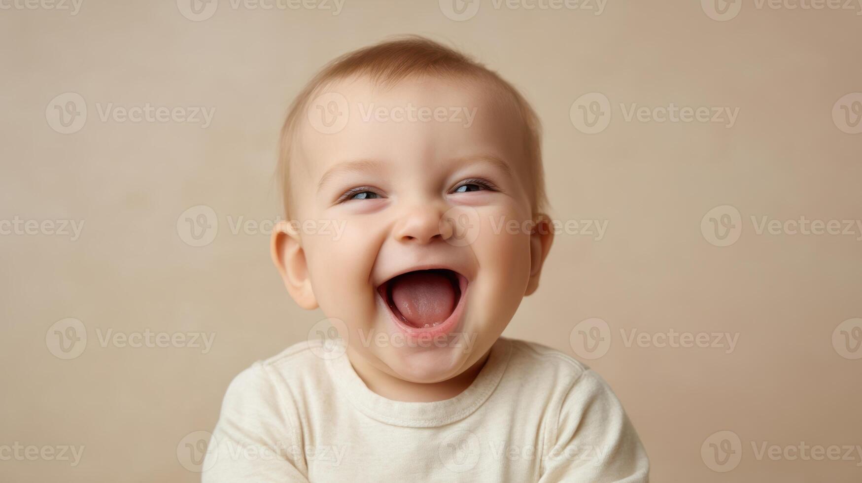 The joyful baby with a bright smile radiating happiness and innocence. photo