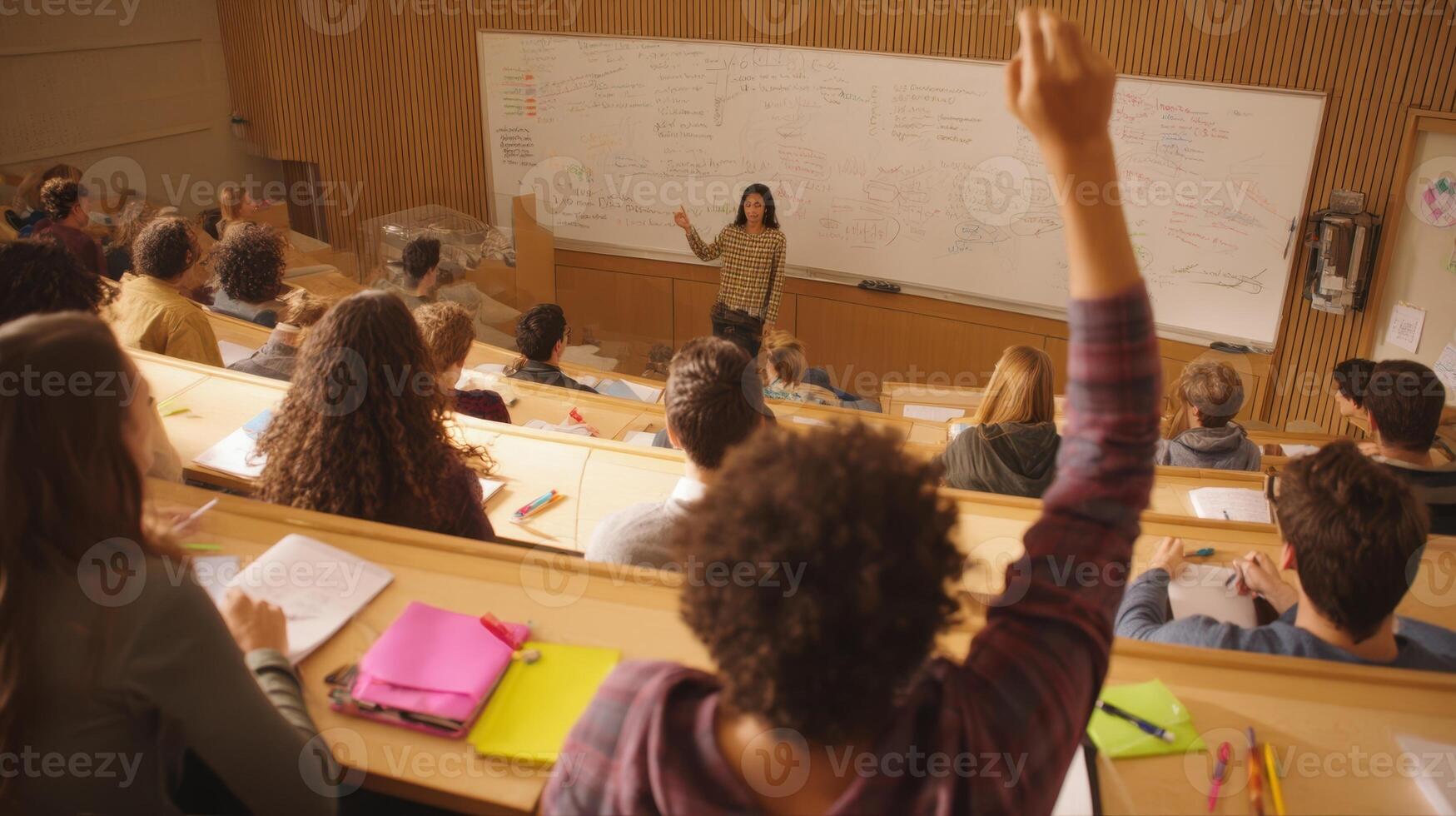 The engaged students participating in a dynamic classroom discussion led by their teacher. photo
