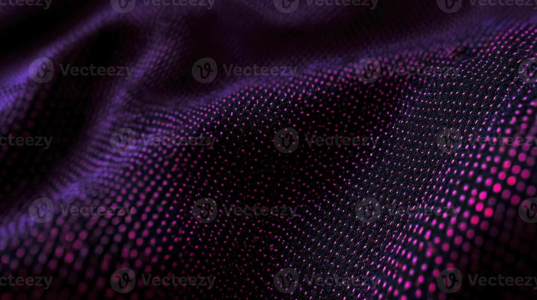 The mesmerizing texture of purple fabric with a shiny surface. photo