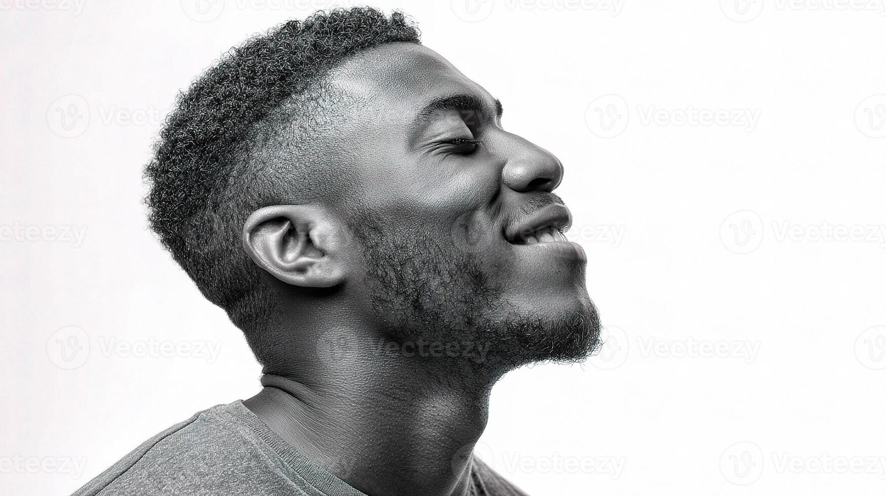 A black man with a smile on his face photo
