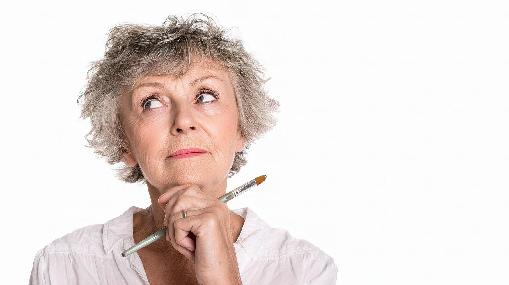 A woman with a brush in her hand photo