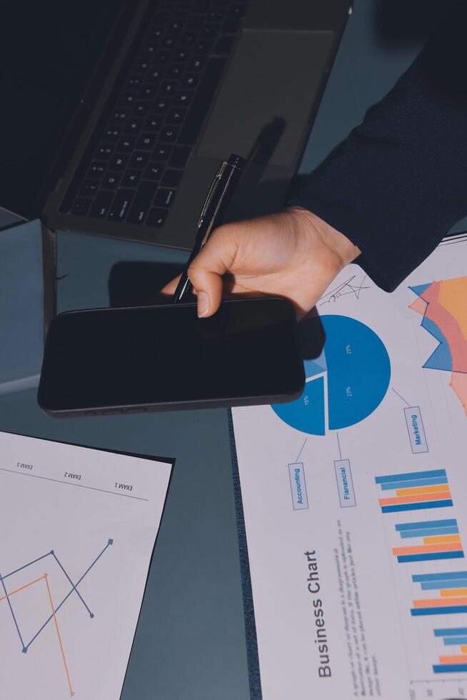 Businessman using a tablet to make a presentation photo
