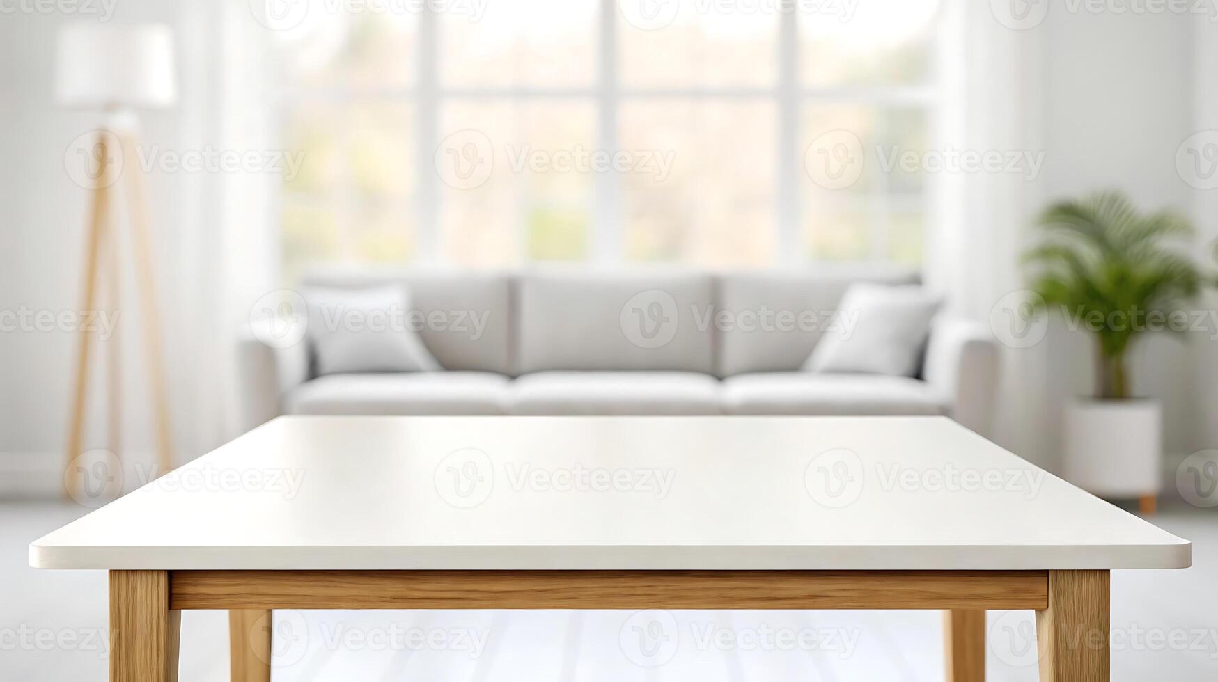 white table in front of a couch in a room photo