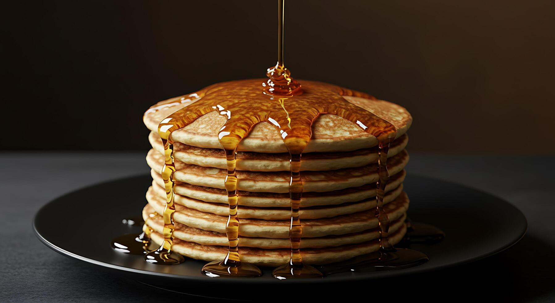A stack of pancakes is being drizzled with syrup photo
