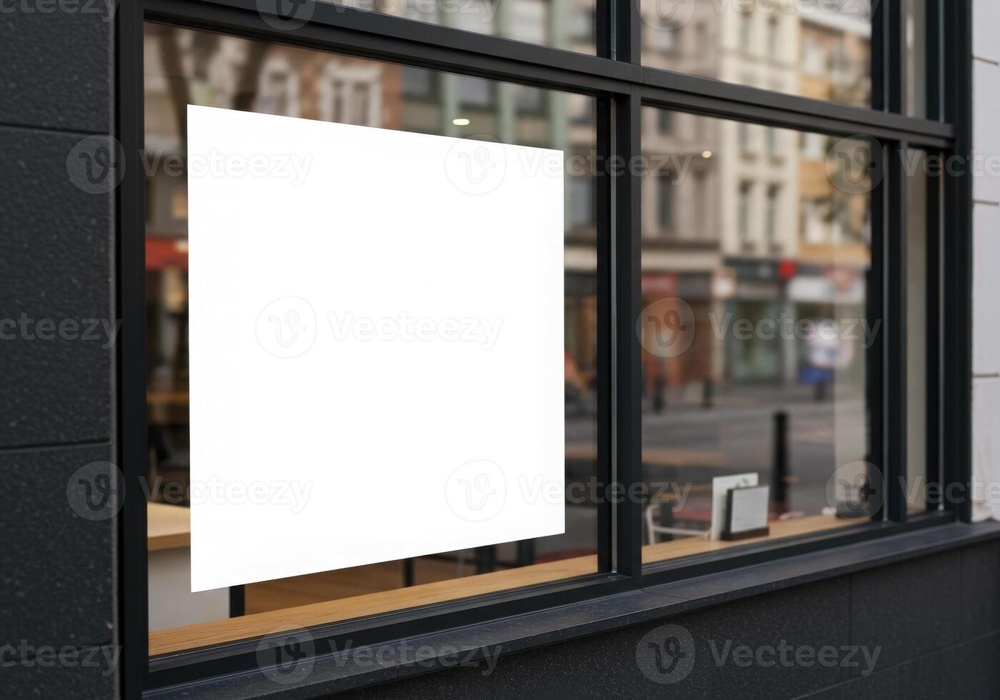 Blank white square in a window of a cafe photo