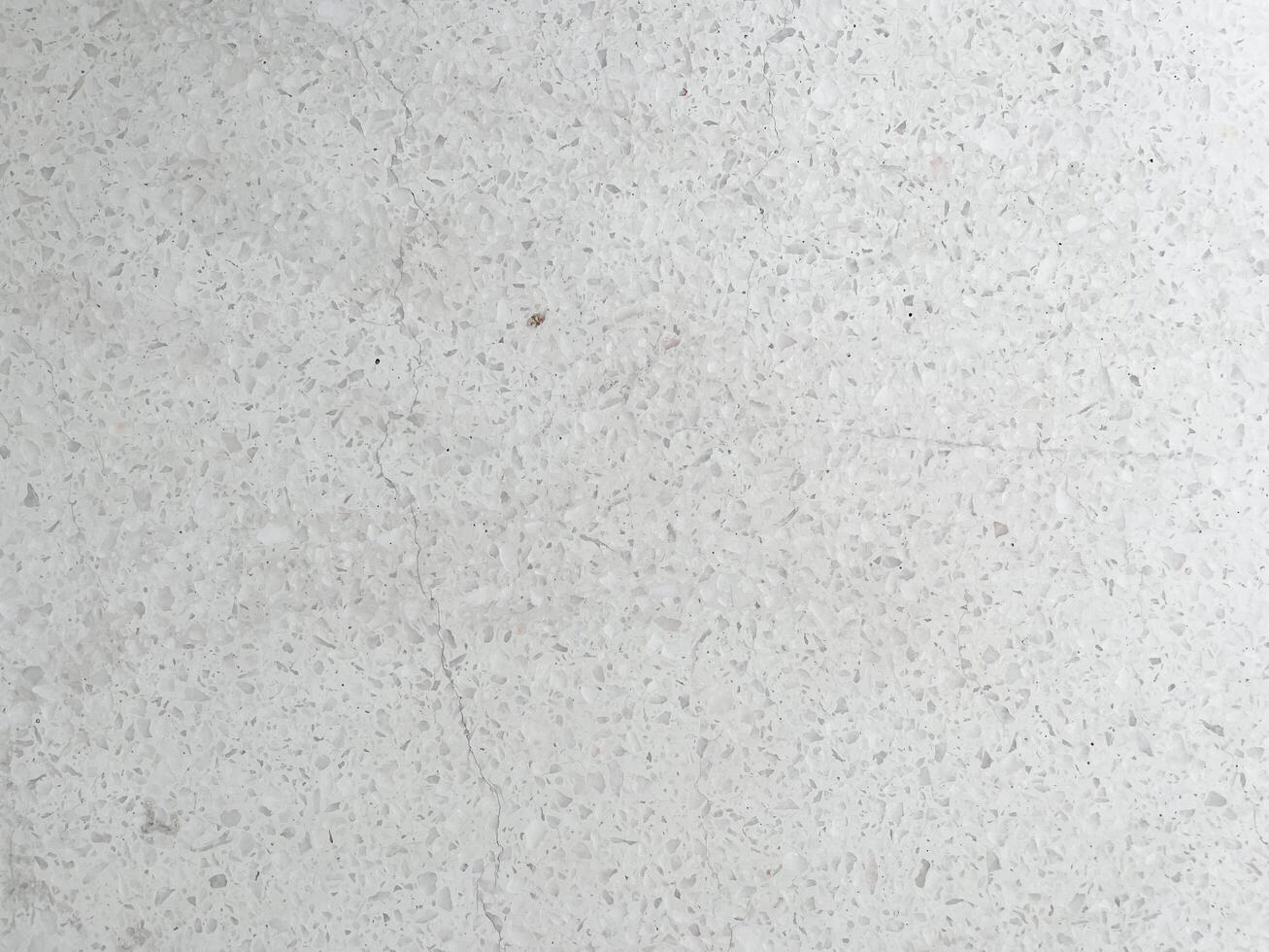 Modern light grey limestone texture background in white light polished empty wall paper. luxury gray concrete stone table top desk view concept grunge seamless marble. photo