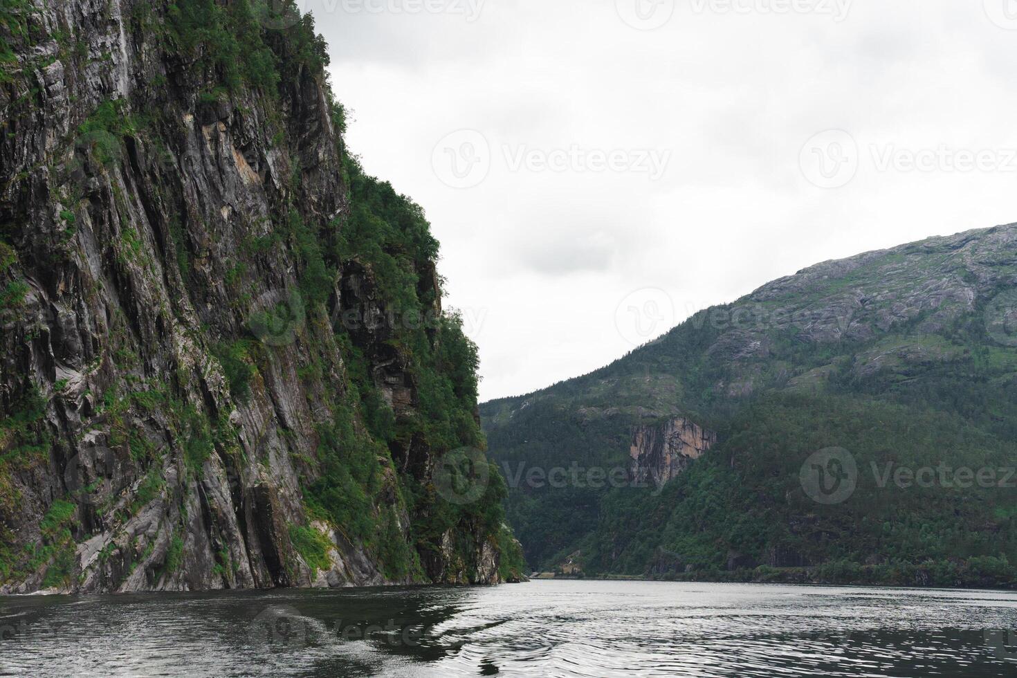 Dramatic fjord cliffs and mountain landscape near Bergen, Norway in summer photo