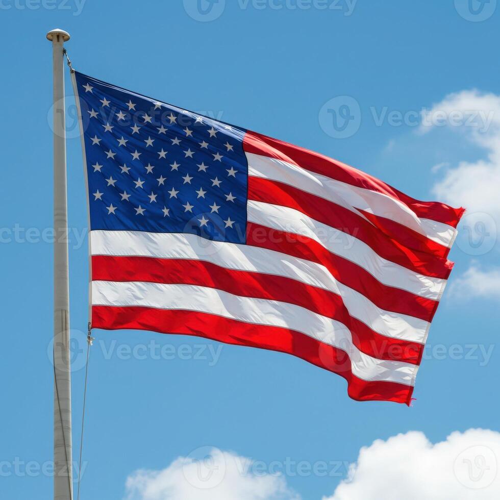 A large american flag flying in the wind photo