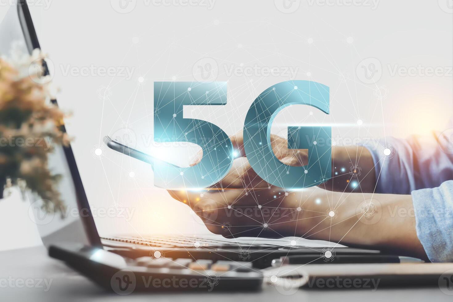 Asian man hand holding a phone with a 5G high speed mobile connection technology signal. Smart city networking concept, high speed mobile internet, new generation network, mixed media and convenience photo