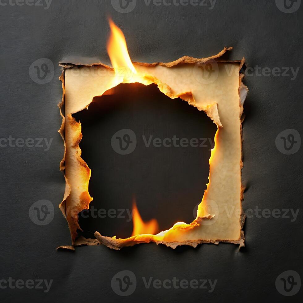 Dramatic Burnt Paper Hole with Flames on Dark Background for Creative Designs photo