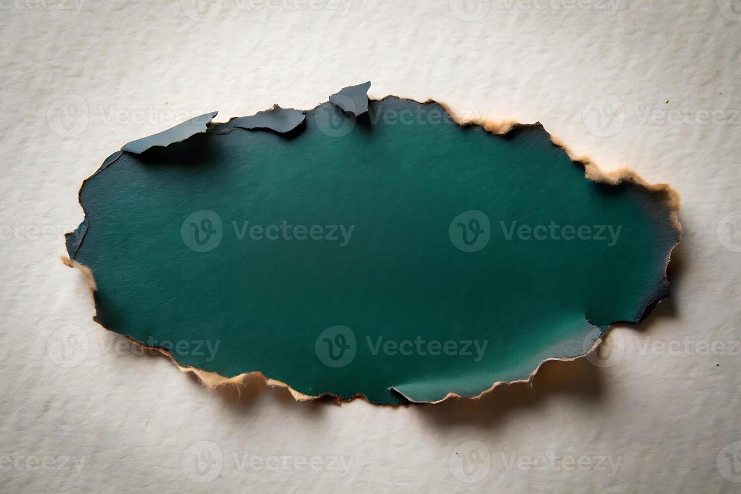 Burnt Paper Hole with Green Background - Abstract Grunge Texture Overlay photo
