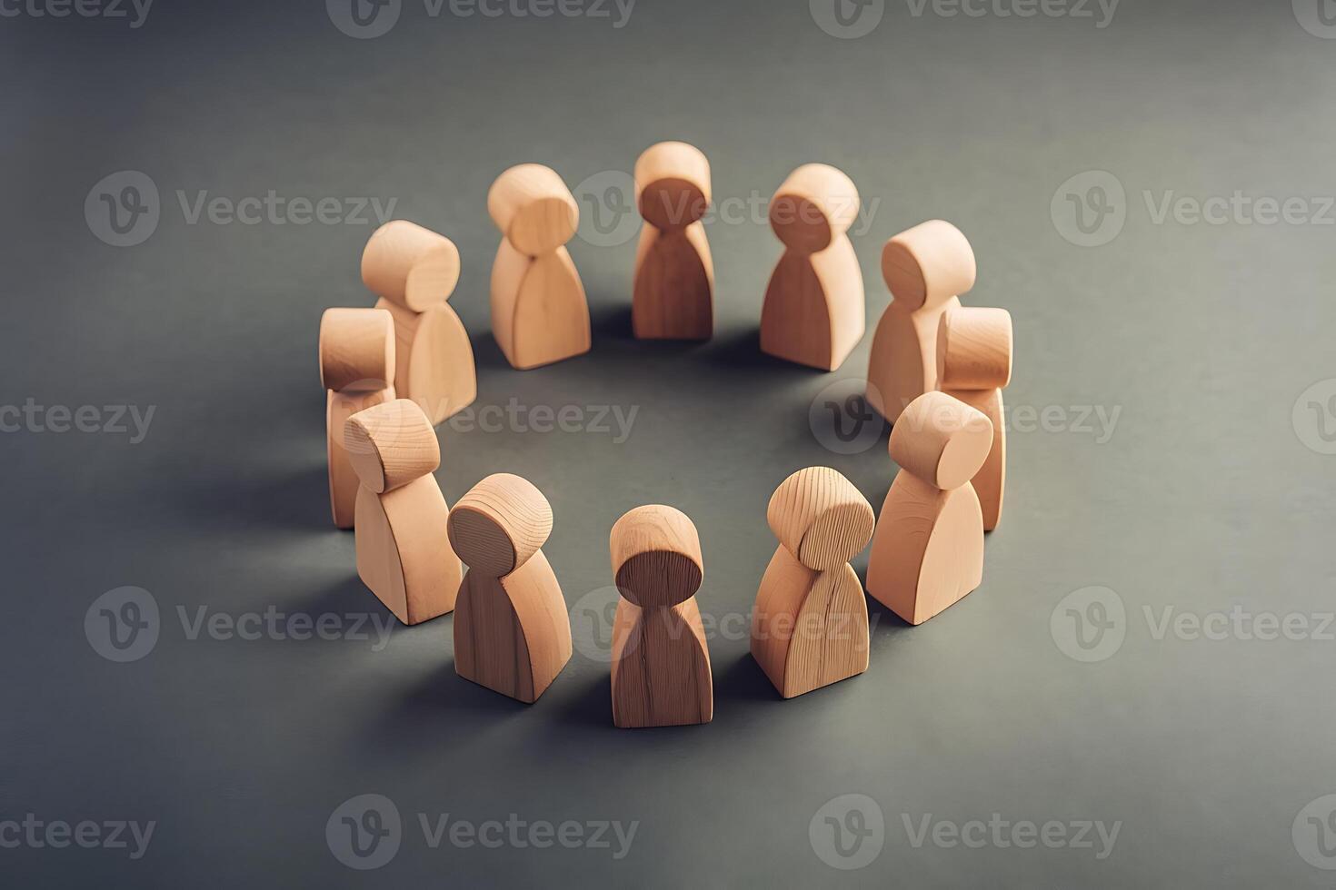 Wooden Figures in a Circle Symbolizing Teamwork and Collaboration photo