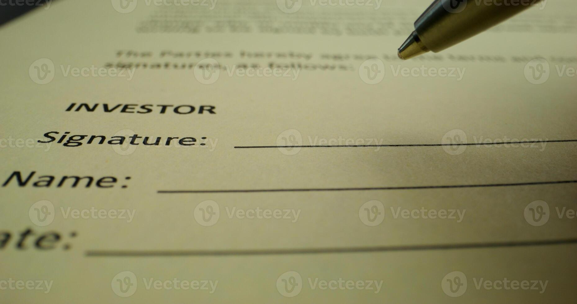 The man puts his signature on the document on behalf of the investor, close-up of his signature, an unrecognizable person - behalf photo