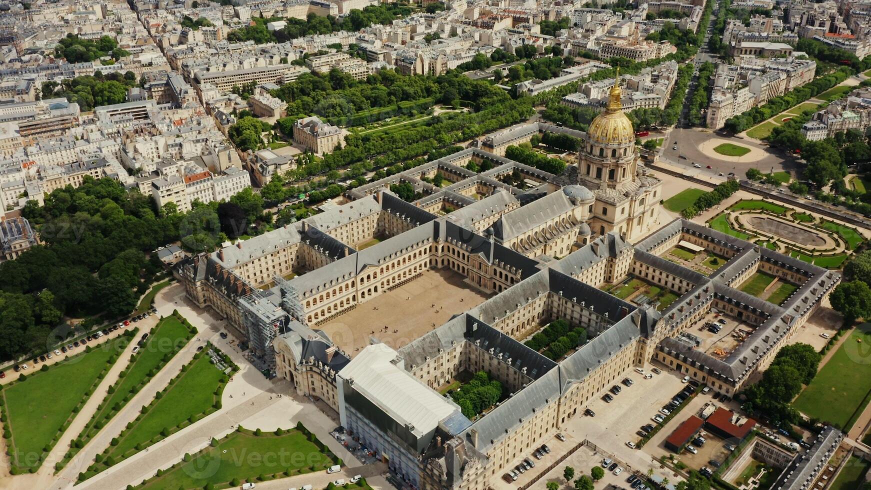 Architectural complex and park area of Les Invalides in the historic center of Paris, bird's eye view on a cloudy day. Cityscape of Paris from drone, France photo