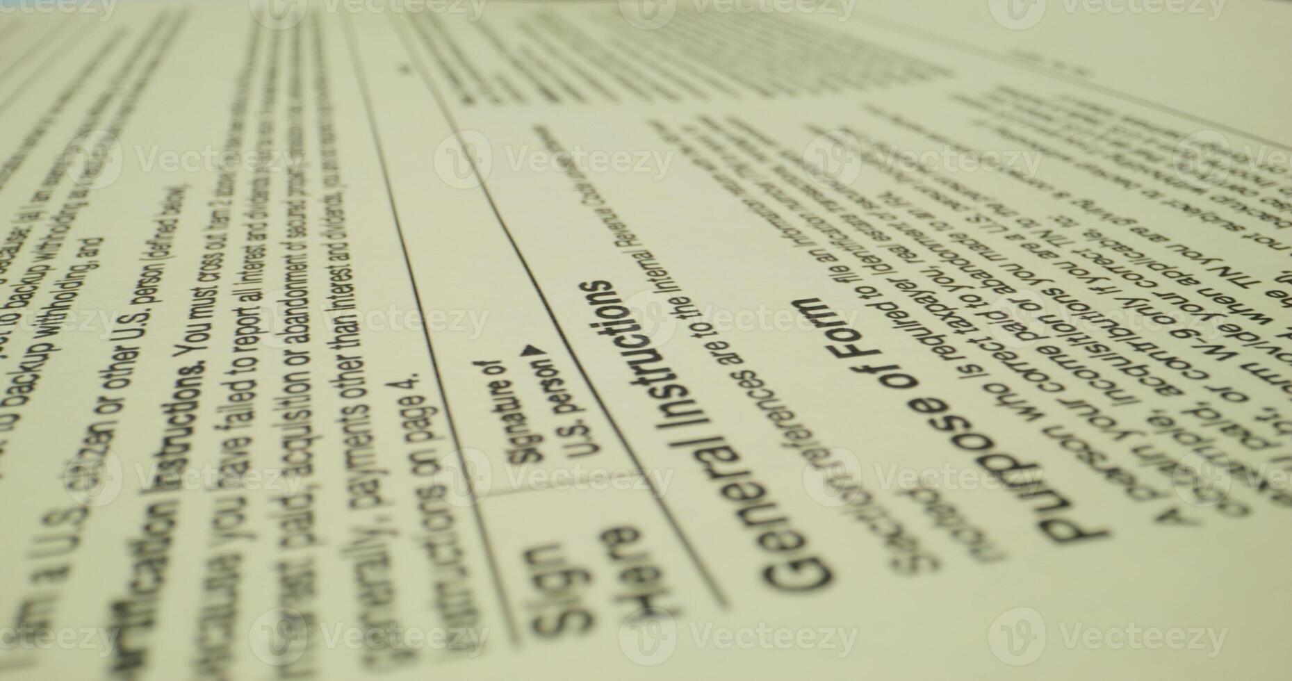 The form of the taxpayer's documents. The pen is on the paper. Close-up photo