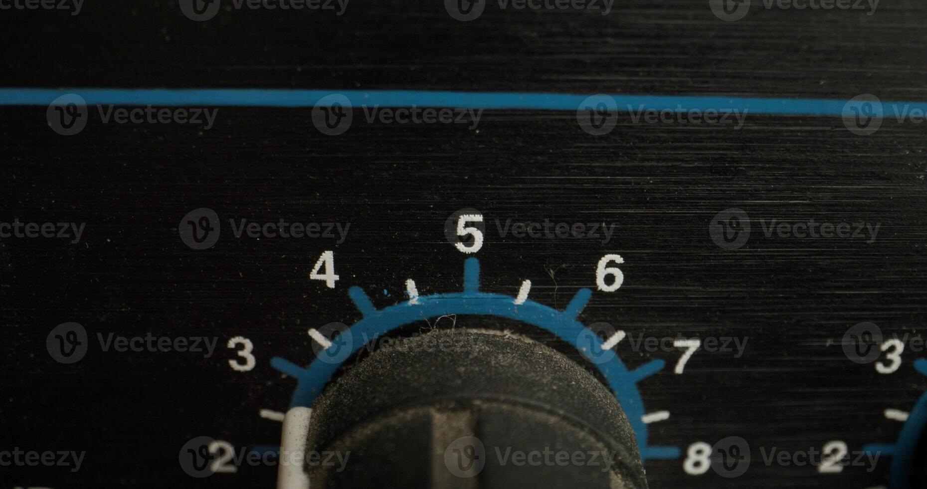 A man adjusts a vocal compressor in a recording studio. Close-up of his hand, an unrecognizable person photo