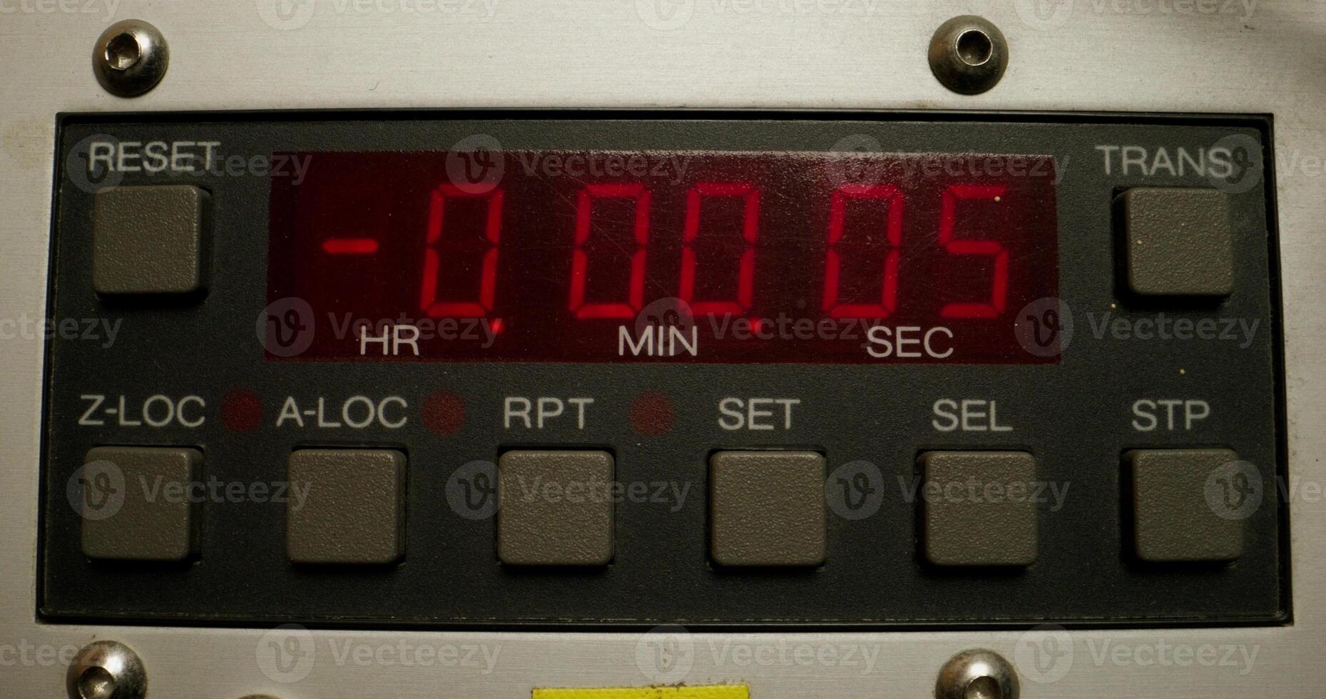 Timer in a professional tape recorder while recording studio sounds. Close-up of the screen with the countdown - screen photo