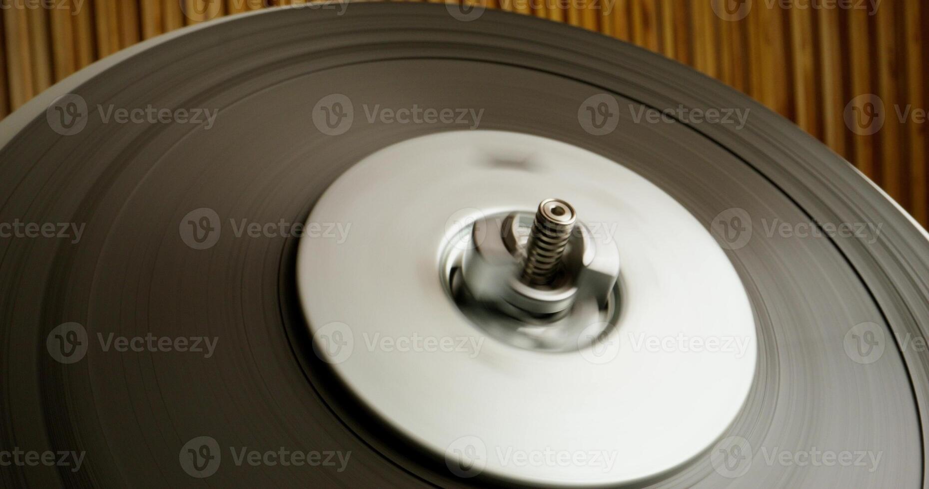 Sound recording on a tape recorder in a recording studio. Fast movement of the magnetic tape, close-up - magnetic photo