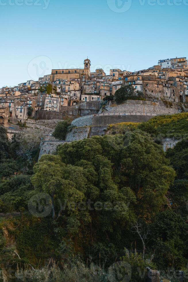 Trees And Nature Surrounding The Village On The Hill photo