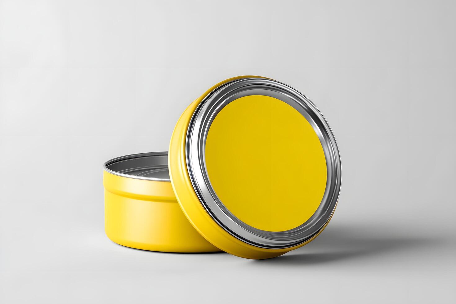 Bright yellow tin container label mockup on studio surface photo