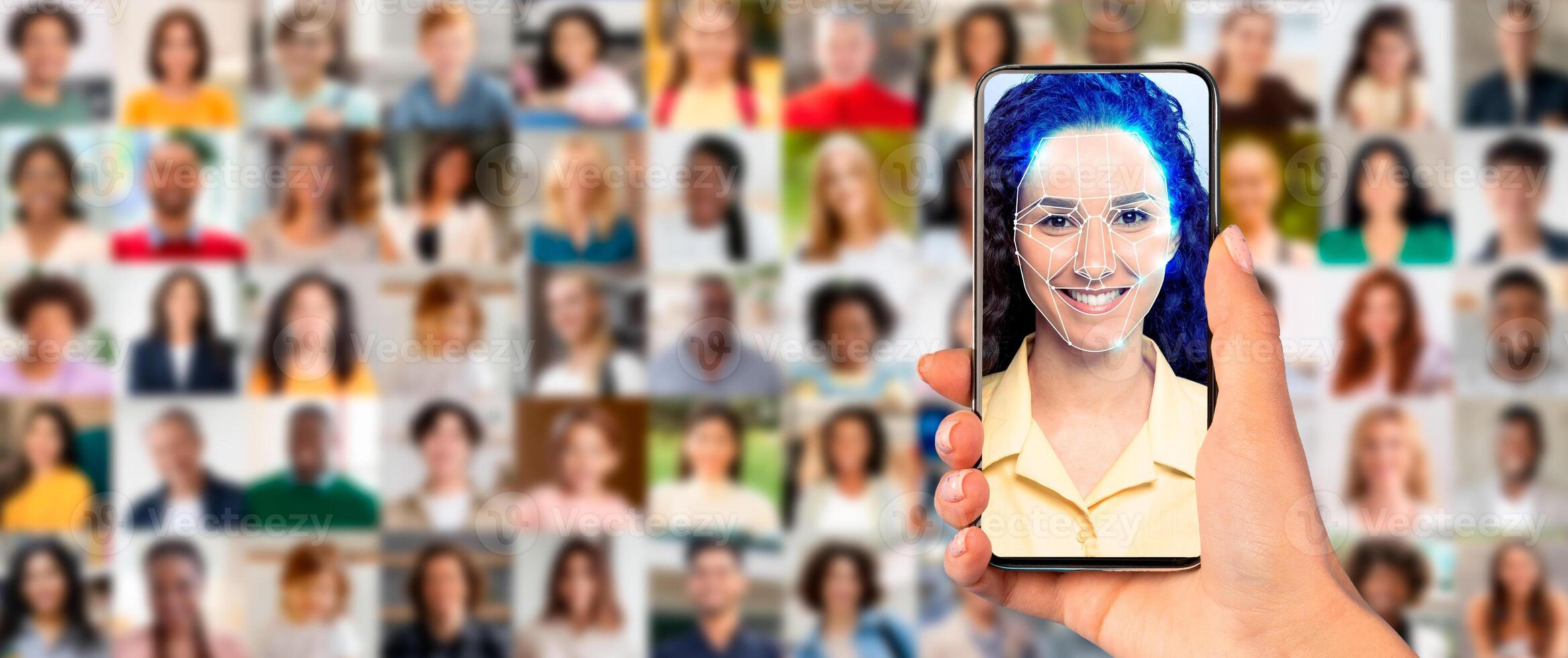 A person holds a smartphone displaying a facial recognition scan. The background features a collage of diverse faces, highlighting the impact of technology on identification processes. photo