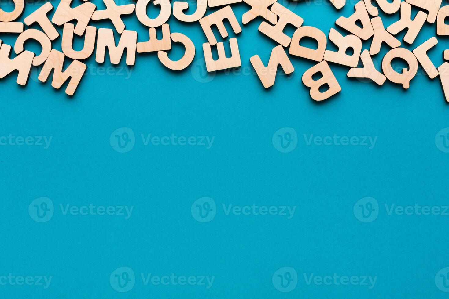 Wooden english letters background, copy space. Alphabet study, abc, education concept photo