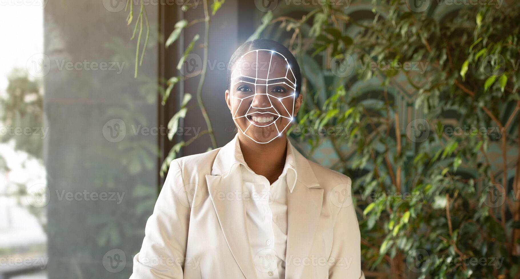 A professional individual stands indoors, showcasing the integration of facial recognition technology. This new method of identification represents a shift towards a more secure future. photo