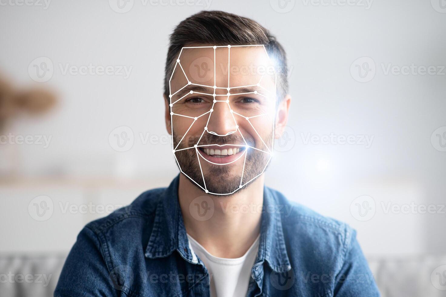 A man is smiling while facial recognition technology analyzes his features. This uses advanced identification systems to adapt to the new normal of security and convenience. photo