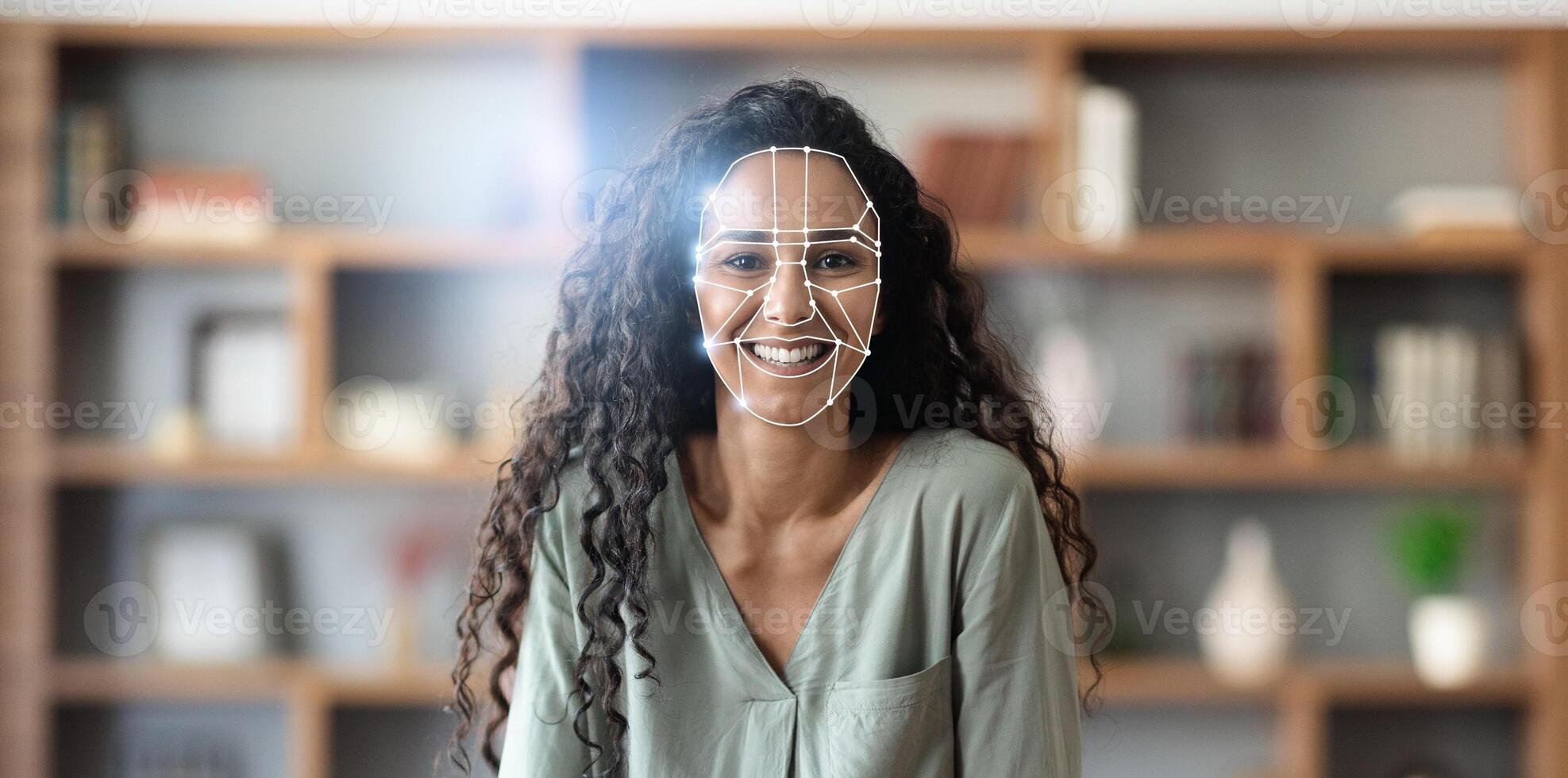 Facial recognition technology is utilized for identification, showcasing a woman with curly hair smiling while a digital overlay displays facial features. photo