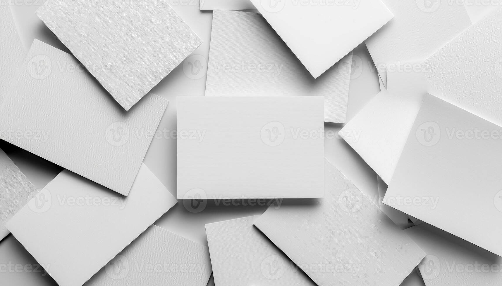 Various white cards lie scattered on a flat surface, representing themes of minimalism and ecology. photo
