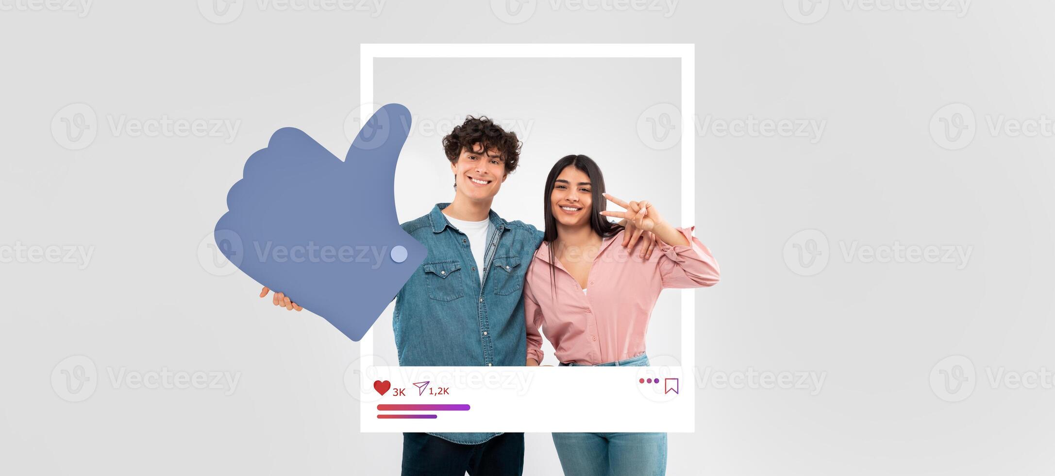 Two young influencers smile happily while posing with a thumbs-up sign, promoting online engagement and interaction. Their casual attire and cheerful expressions create a vibrant atmosphere. photo