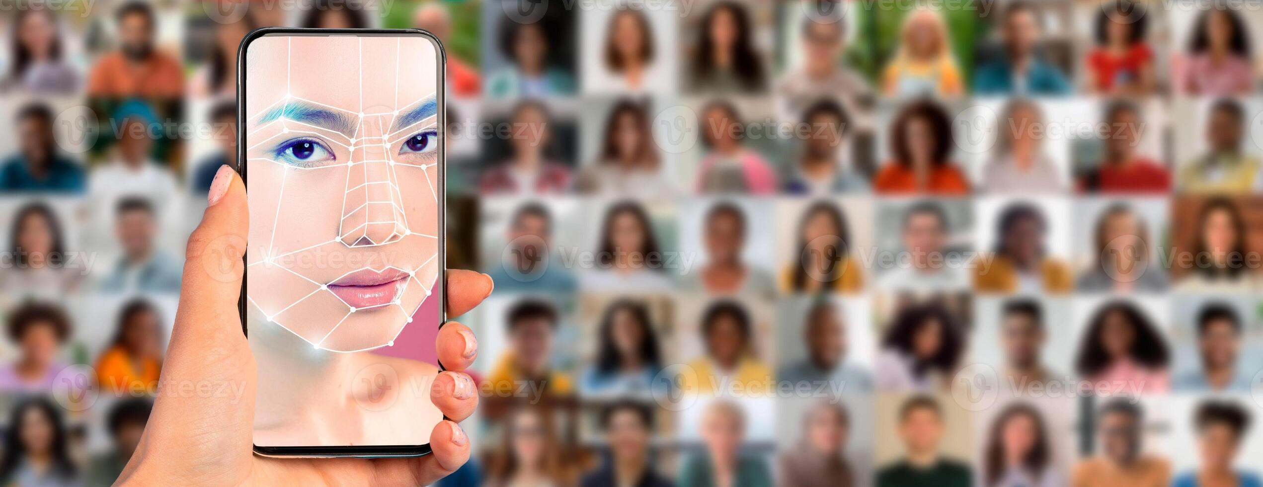 A hand holds a smartphone displaying a face scan, showcasing advanced identification technology. Behind, a collage of diverse individuals reflects modern practices in biometric recognition. photo