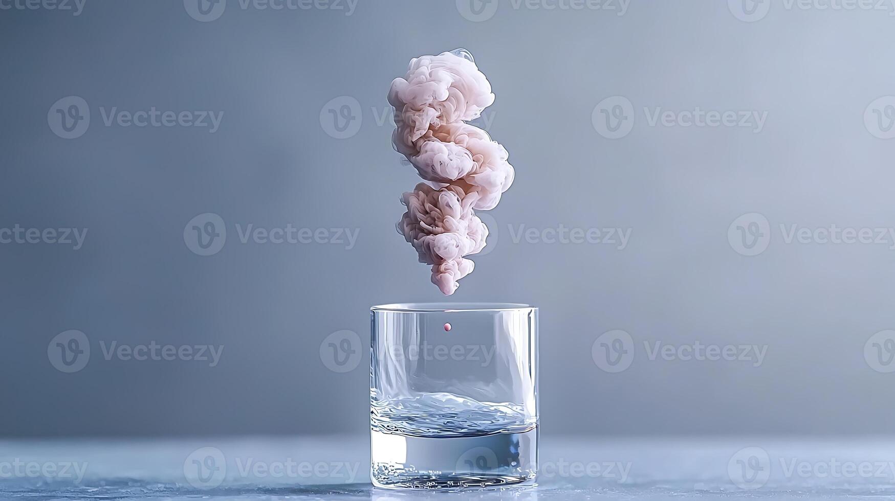 A glass of water captures a pink smoke swirl rising above, creating a surreal visual effect photo