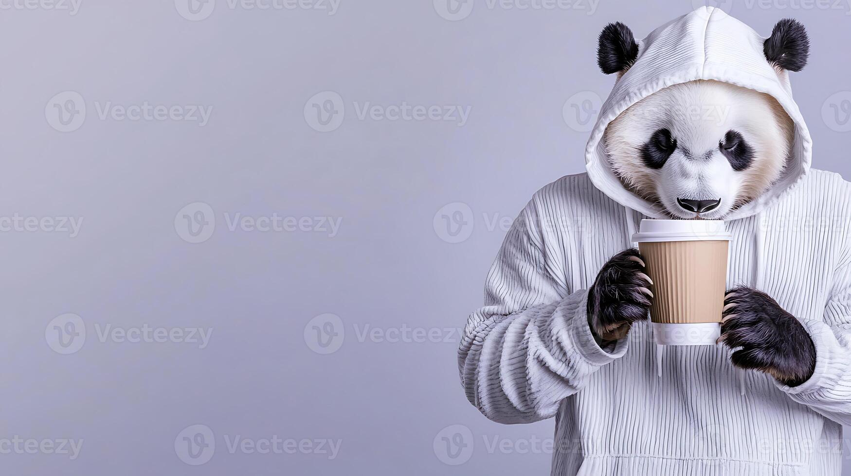 A panda in a cozy hoodie sipping coffee, set against a minimalist background photo