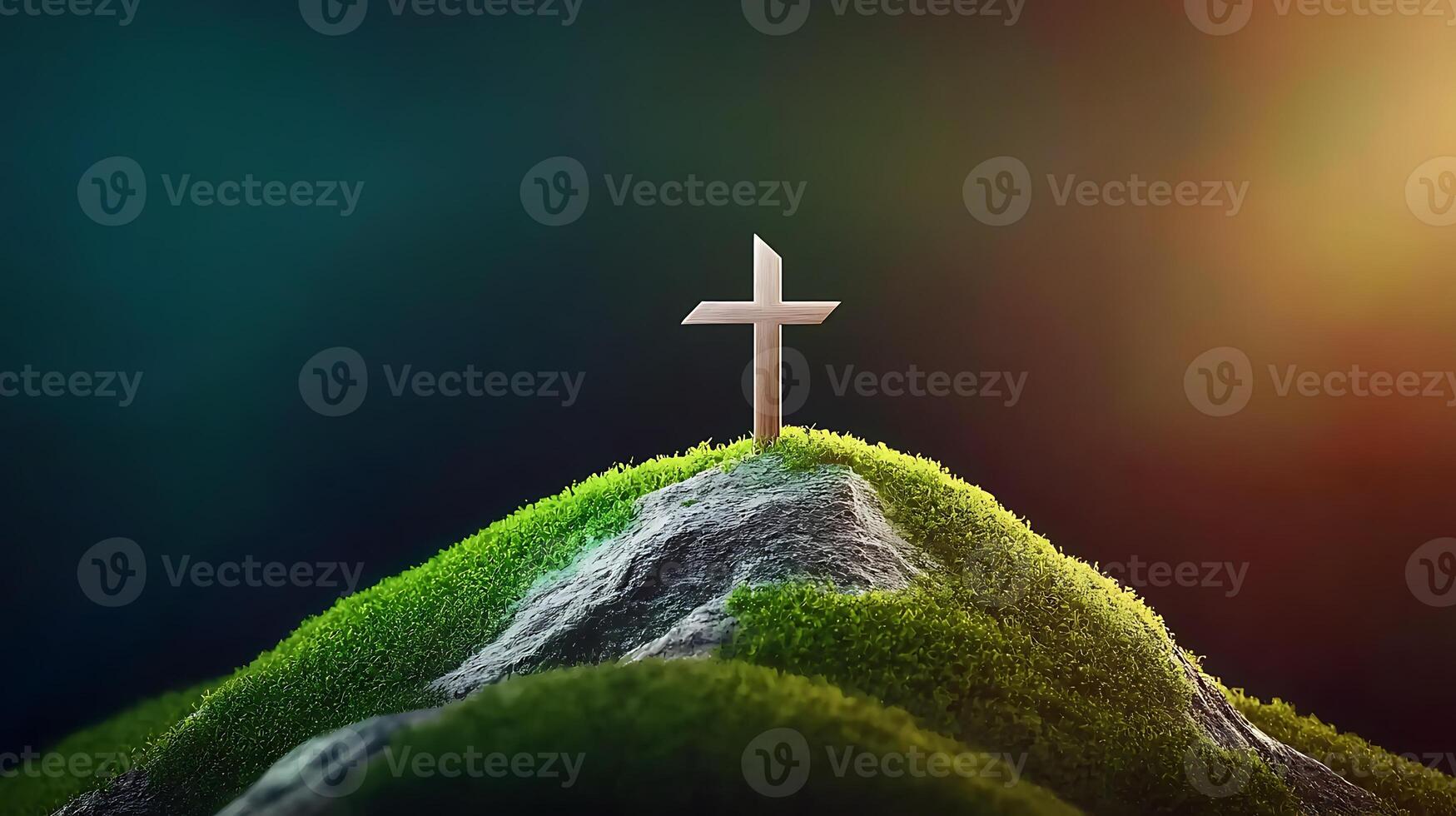 A serene cross atop a lush green hill under a vibrant sky at sunset, symbolizing hope photo