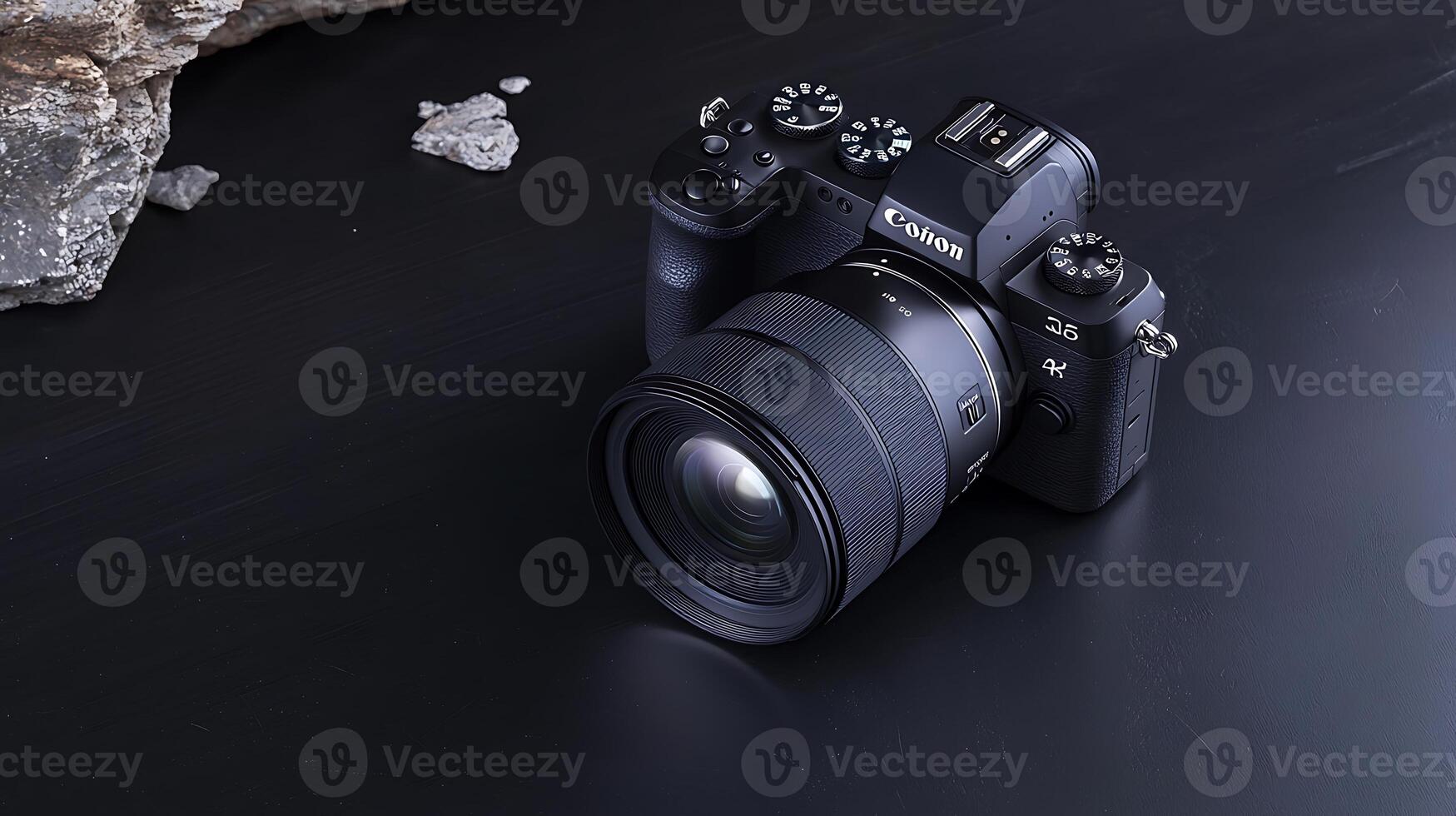 A sleek camera positioned on a dark surface, showcasing its lens and controls, with rocks nearby photo