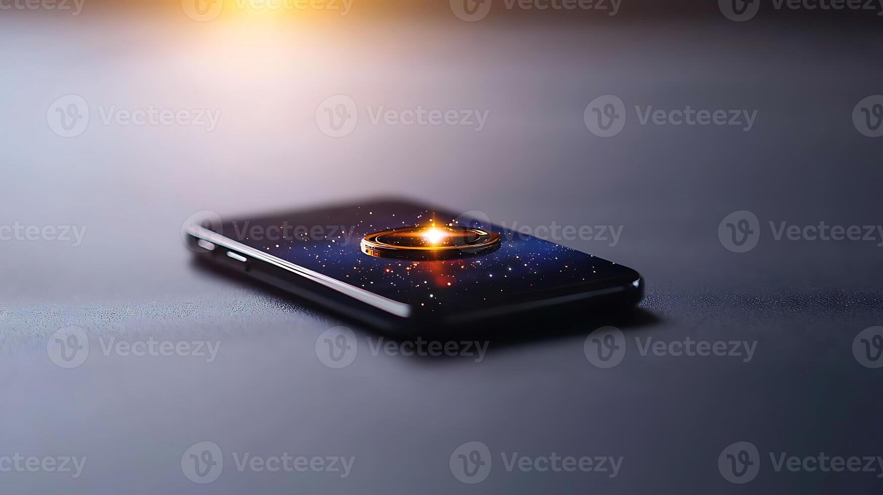 A sleek smartphone displaying a cosmic design with a glowing ring, set on a dark surface photo
