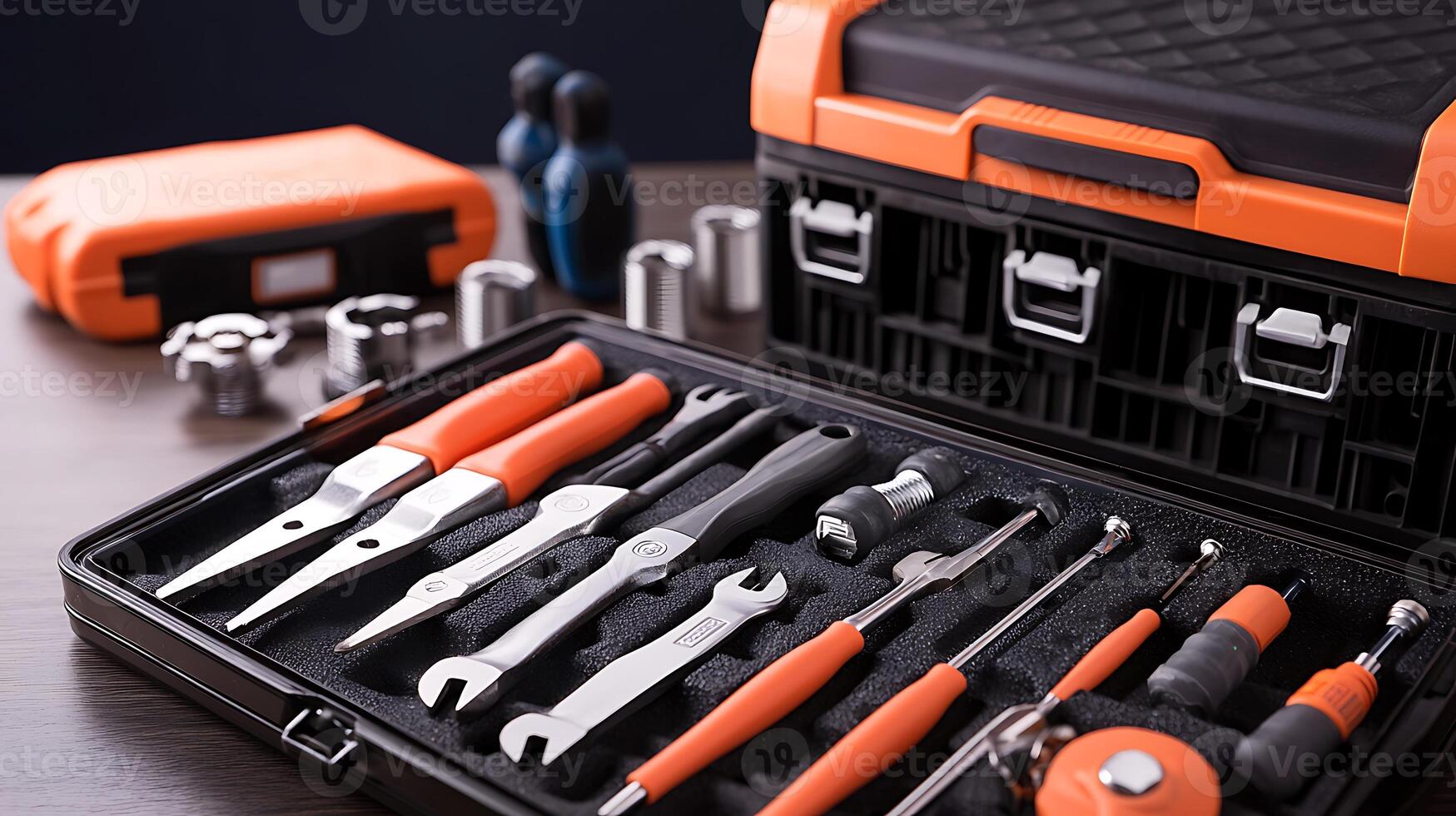 A well-organized toolbox filled with various hand tools on a wooden surface, ideal for DIY projects photo