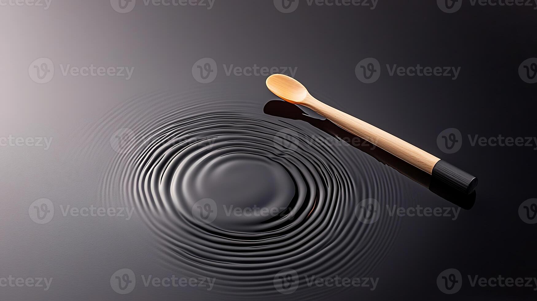 A wooden spoon resting on a glossy surface, creating ripples in calm water, serene ambiance photo
