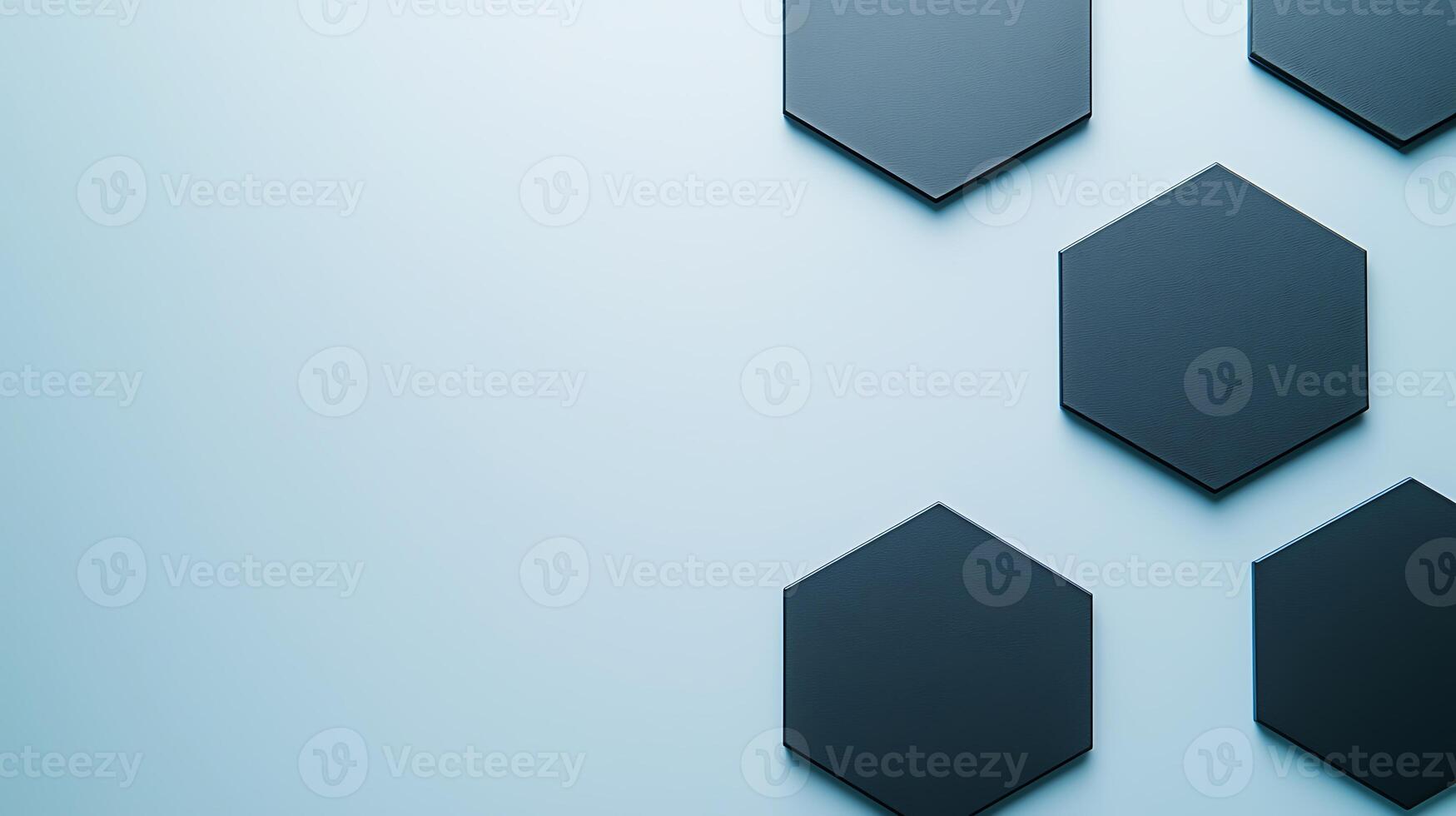 Abstract arrangement of black hexagons on a soft blue background, creating a modern aesthetic photo