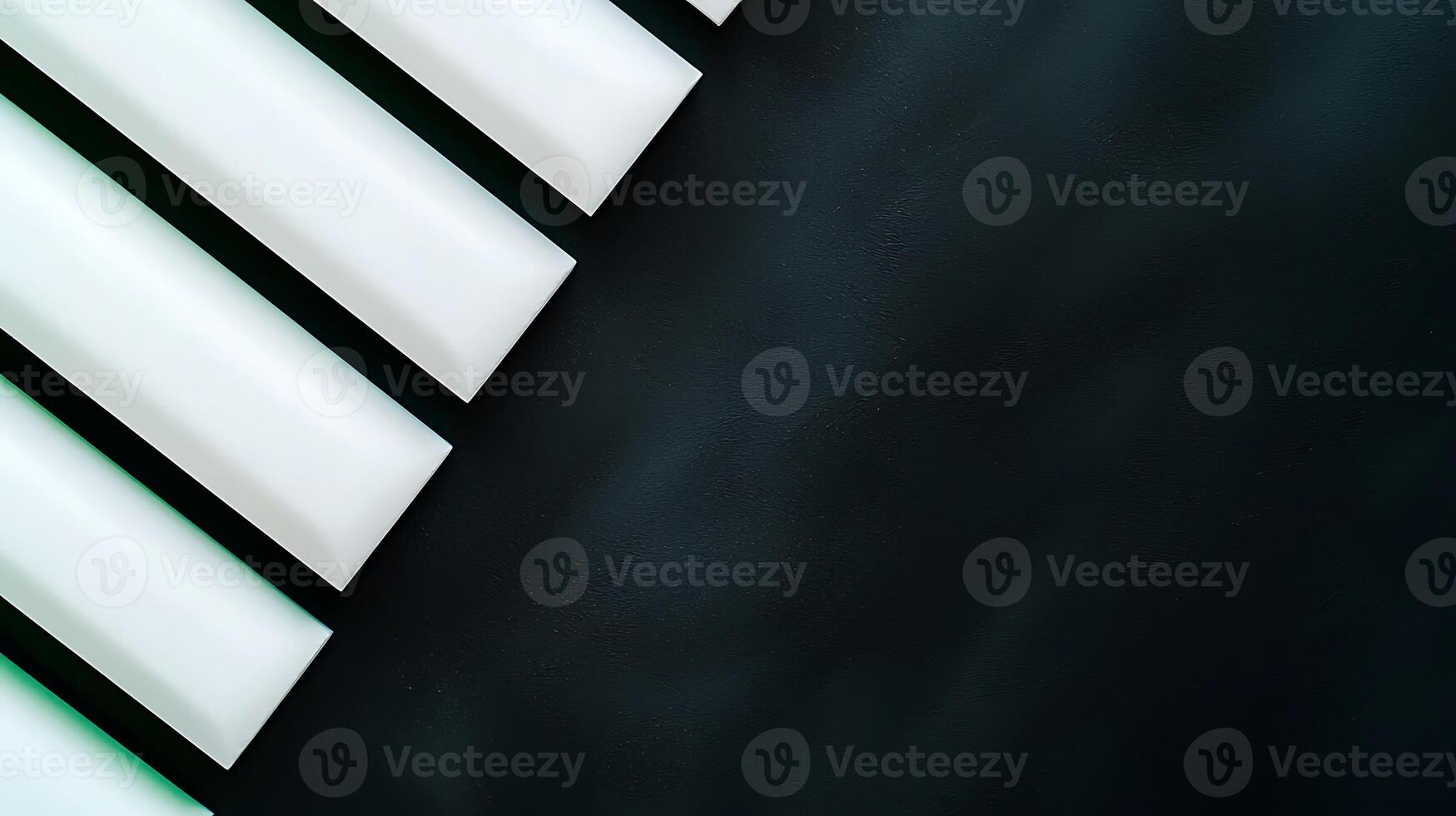 Abstract arrangement of white geometric shapes on a dark background creating a modern aesthetic photo