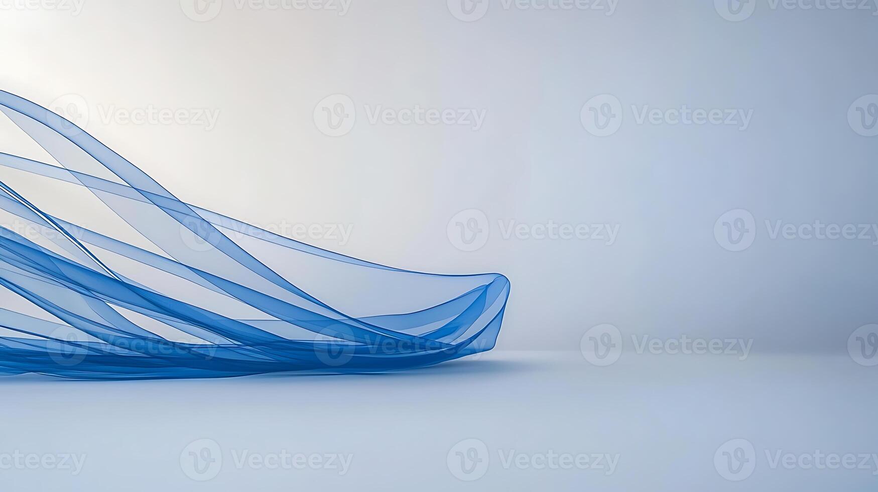 Abstract blue waves gracefully flowing across a minimalist background, evoking tranquility and motion photo