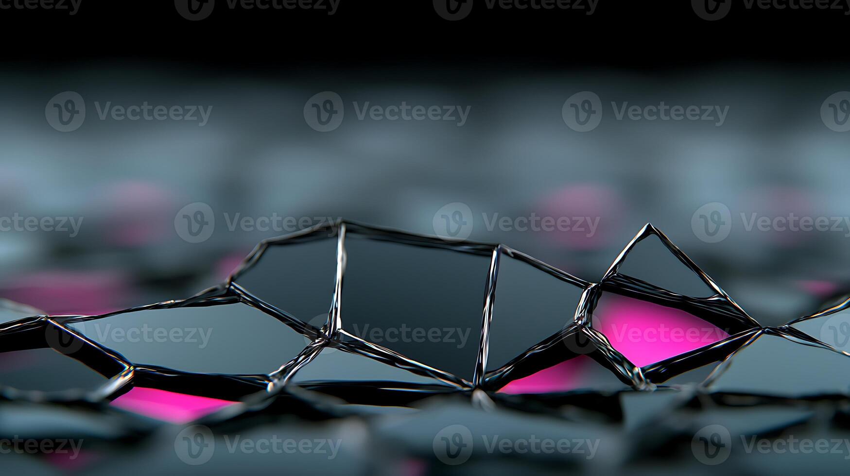 Abstract close-up of fragmented glass-like surfaces reflecting pink and black hues in a blurred background photo