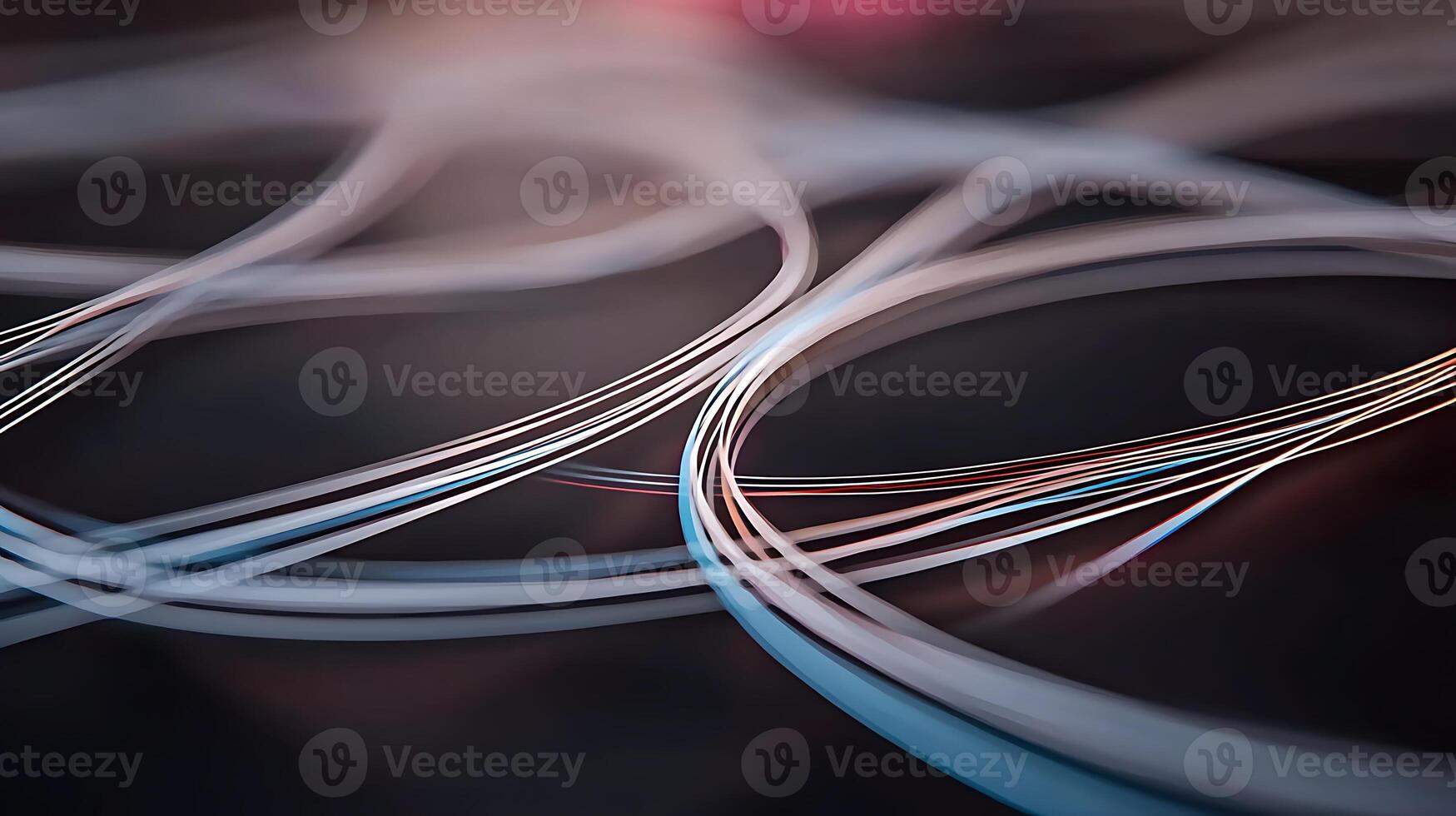 Abstract composition of flowing lines creating a dynamic visual effect in a dark background photo