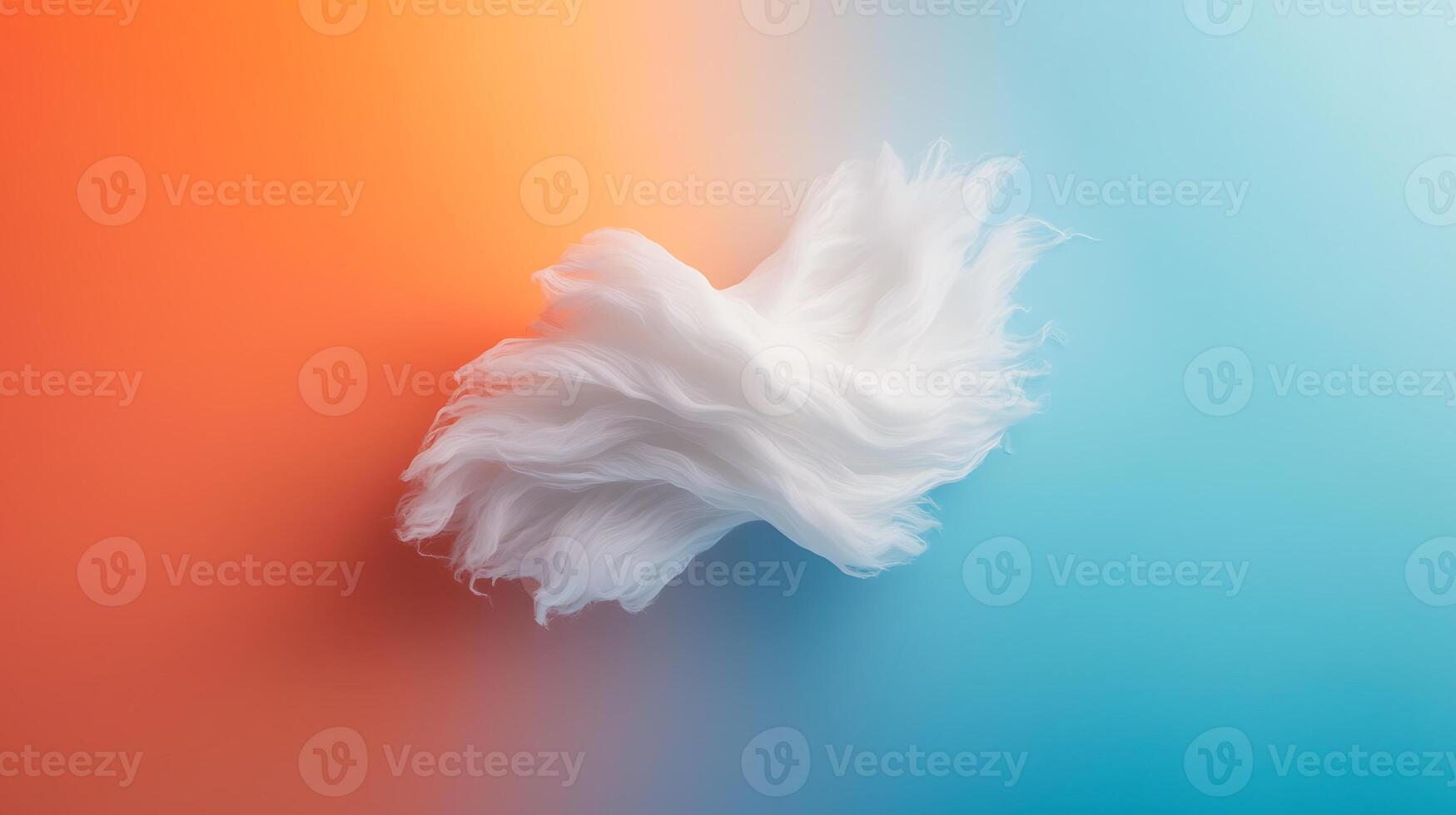 Abstract composition of white wispy texture against a vibrant orange and blue gradient background photo