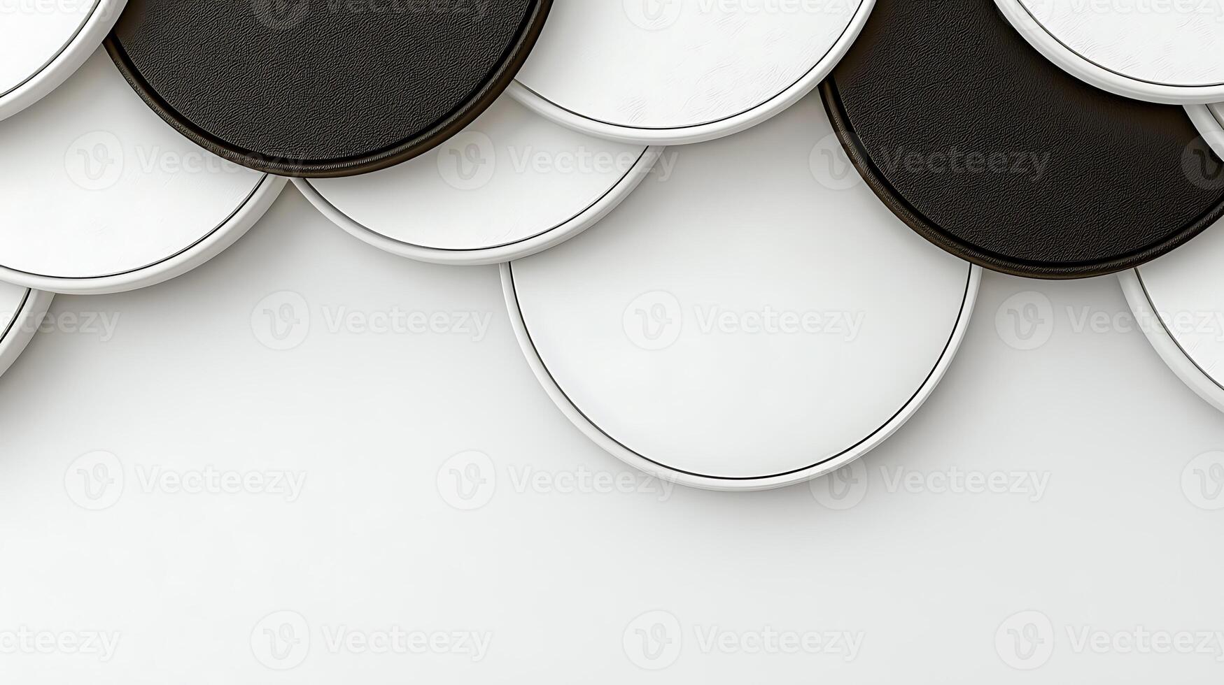 Abstract design featuring overlapping circular shapes in black and white on a smooth background photo